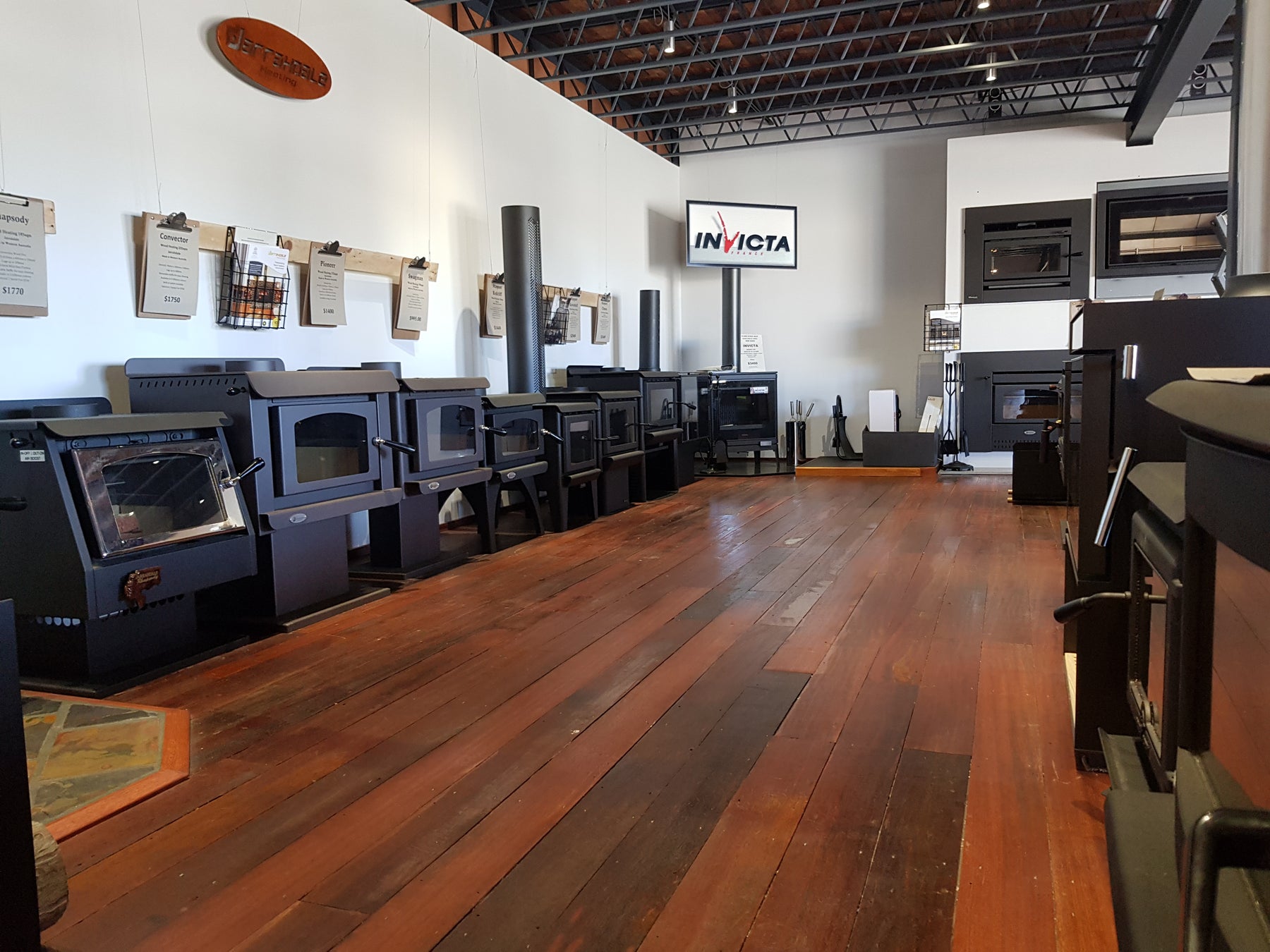 Wood & Gas fire heating showroom floor at Albany Eco House. On display we have the range of Jarrahdale Pacific Energy Masport Kent